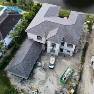Aerial perspective during the final quality check of the completed concrete tile roofing project.