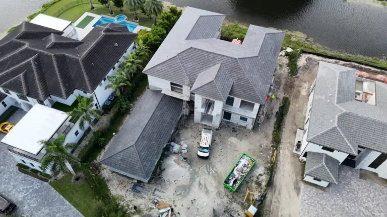 Aerial perspective during the final quality check of the completed concrete tile roofing project.