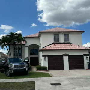 Close-up showing the professional finishing and attention to detail on the new Doral clay tile roof.