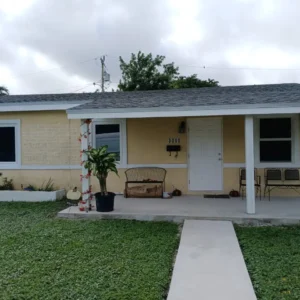Focusing on the professional sealing and insulation applied around the new impact windows in Miami Gardens.